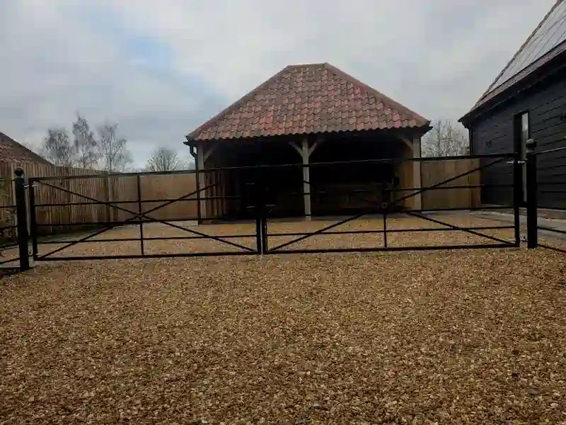 Bespoke driveway gates powder coated in gloss black by Powderplus Ltd, Haverhill Suffolk